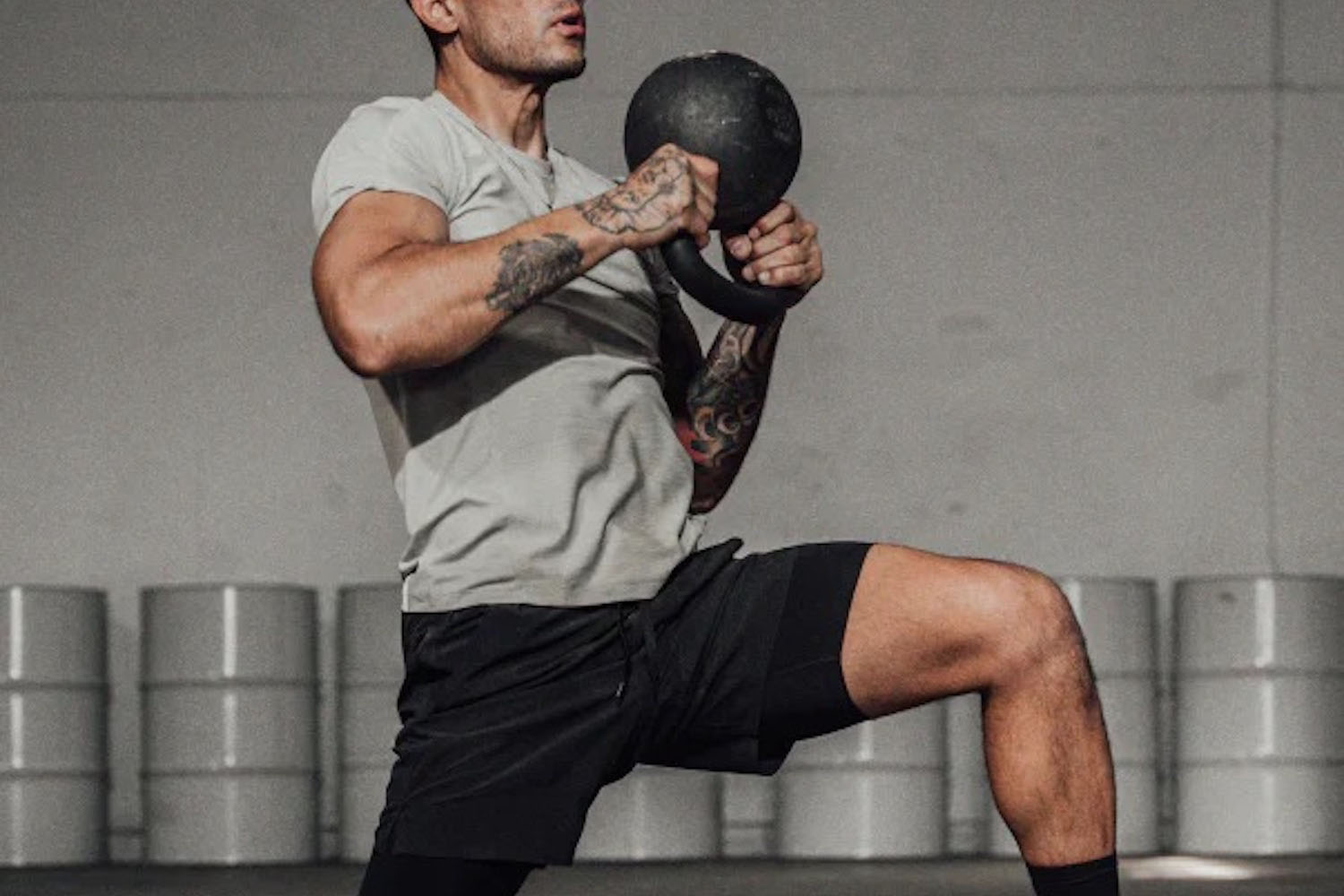 a model in Ten Thousand clothing on a grey background