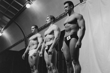 Egyptian bodybuilder Antoine Boulos, British bodybuilder Reuben Martin, and South African bodybuilder Jannie Graaff, competitors during the pre-judging for the Mr Universe contest, at the Royal Hotel in Woburn Place in the Bloomsburt district of London, England, 16th September 1960.