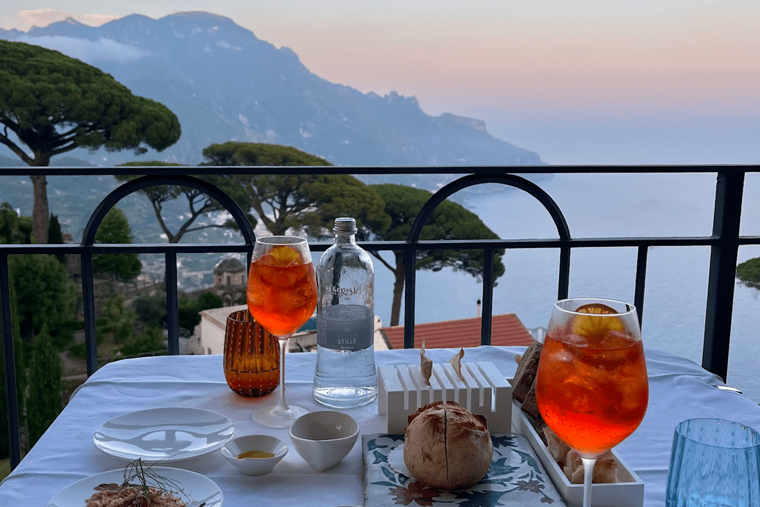 aperol spritzes at sunset in ravello